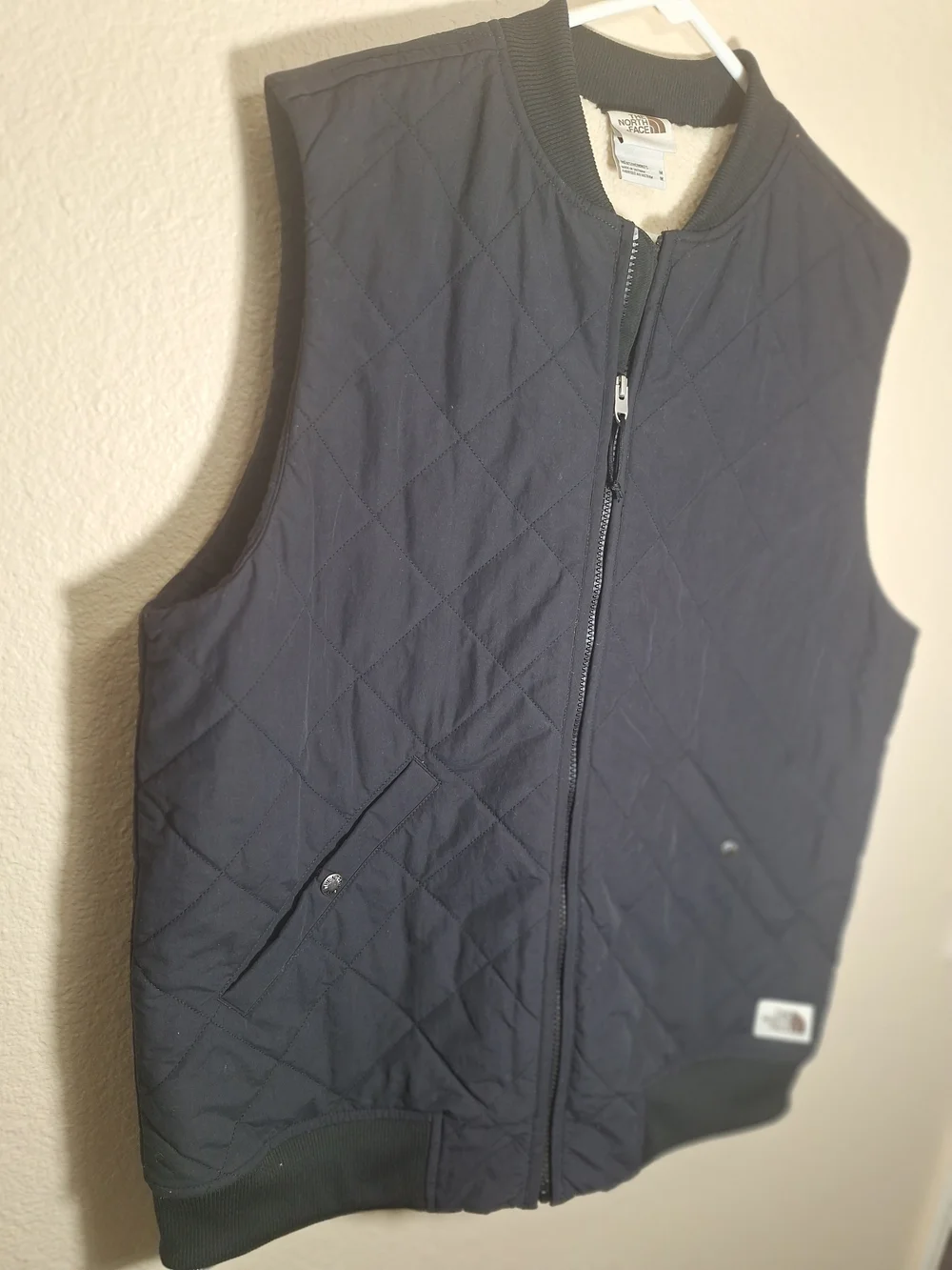The North Face Black Quilted Vest with Sherpa Lining